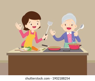 Happy daughter looking at her grandma while cooking ,lovely grandmother and woman cooking in kitchen okay gesture,grandmother old mother mother-in-law and daughter-in-law daughter cook in kitchen