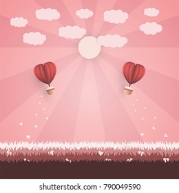 Happy valentine’s day concept. Red origami two balloons contain the heart and flying heart on the sun, light and grass background