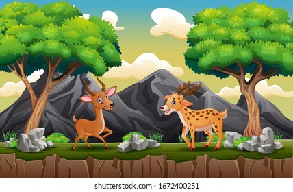 Happy deers playing at the hill landscape