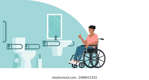 Happy disabled woman giving a thumbs up and an accessible toilet, copy space