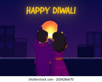 Happy Diwali Celebration Background With Back View Of Young Boy And Girl Holding Sky Lantern.