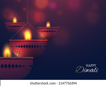 Happy Diwali celebration background with blurred lighting effect and illustration of hanging oil lamps. Can be used as greeting card.