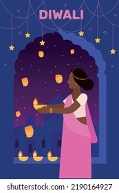 Happy Diwali Celebration Urban Background with Cartoon Man and Woman Holding Sky Lanterns. Illuminated Oil Lamps (Diya) 
A woman wearing traditional dress holding Diwali festival lamps in her hand