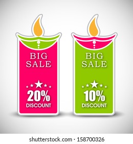 Happy Diwali discount tags, stickers or labels with colorful oil lit lamps design on abstract grey background. 
