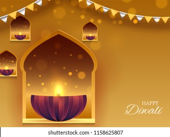 Happy Diwali festival celebration concept, creative illuminated oil lamps (Diya) golden blurred background decorated with party flags.