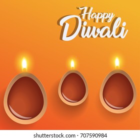 happy diwali. traditional indian diya oil lamp.