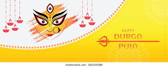 Feliz diseño de pancarta Durga Puja con los ojos de la diosa Durga y trishul. ilustración vectorial.