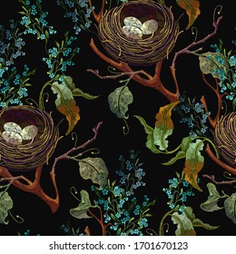 Happy easter art. Flowering apple tree, meadow herbs and bird nest with eggs. Seamless pattern. Embroidery design. Fashion spring garden concept. Template for design of clothes, tapestry 