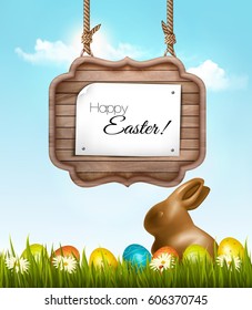  Happy Easter background with chocolate rabbit and wooden sign. Vector.