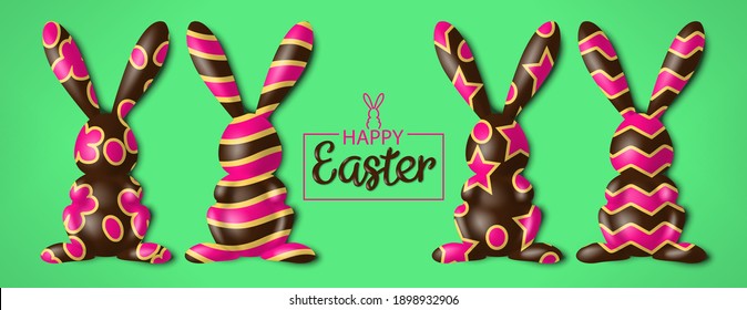 happy easter banner with 3d chocolate decorated rabbits on green background