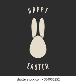 Happy Easter black background. Easter bunny egg.
