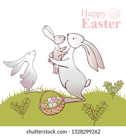 Happy Easter! Easter bunnies and egg in field. Wide copy space for text.