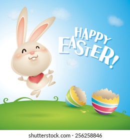 Happy Easter! Easter bunnies and egg in field. Wide copy space for text.