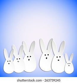 Happy Easter bunnies on a blue background