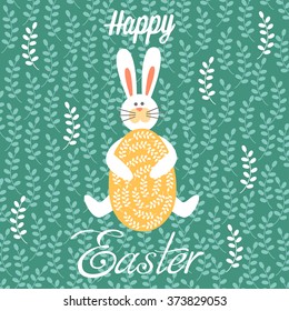 Happy Easter! Easter Bunny with big egg.