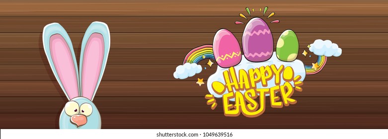 happy easter bunny with calligraphic text, clouds , rainbow and color easter eggs isolated on wood horizontal banner background. vector easter greeting card with blue rabbits ears. Design elements set