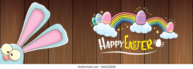 happy easter bunny with calligraphic text, clouds , rainbow and color easter eggs isolated on horizontal banner background. vector easter greeting card with blue rabbits ears. Design elements set 