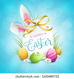 Happy easter bunny ears with easter eggs abstract bokeh background card