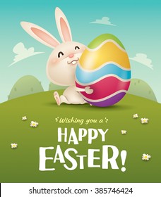 Happy Easter! Easter bunny and egg in field. Wide copy space for text.