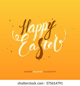 Happy Easter calligraphy. Handwritten phrase lettering with brush and ink in modern brush calligraphy.