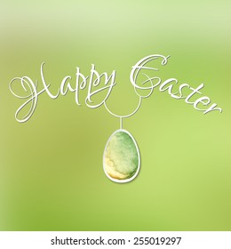 Happy Easter card with 3d watercolor egg on green blurred background.