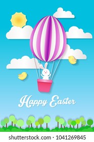 Happy Easter card with Bunny and egg hot air balloon on blue sky, and cloud.paper art style.