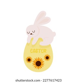 Happy easter card. Easter bunny lies on the egg. Easter egg with sunflower flowers