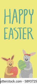 Happy Easter card. Couple of cute brown bunnies holding decorated egg, laughing, wearing red hair bow, flower crown. Hand drawn lettering. Yellow background. Vertical DL size.