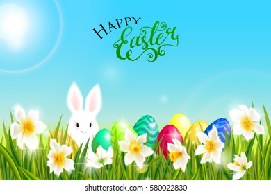 Happy Easter card with eggs, bunny, spring flowers, daffodil narcissus, green grass and blue sky, lettering, calligraphy. Vector illustration EPS10.