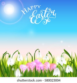 Happy Easter card with eggs, spring flowers, green grass and blue sky, lettering, calligraphy. Vector illustration EPS10.