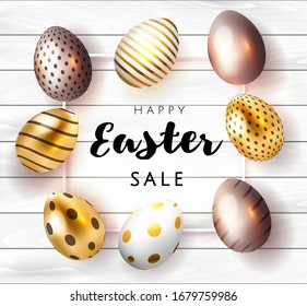 Happy Easter card with handwritten calligraphy lettering with gold paint splash, gold and pink foil eggs pattern isolated in white wooden background. Vector illustration.