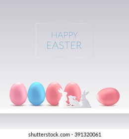 Happy easter card.White rabbits and eggs blue, pink.