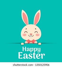 Happy Easter. Easter cartoon smiling bunny in a red bow tie is looking out of the hole and holding the text place.