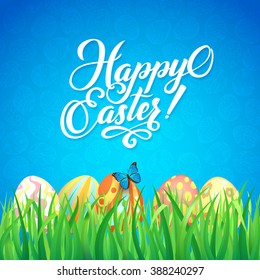 Happy easter. Celebration. Card for Easter with a blue background, green grass and colored eggs.