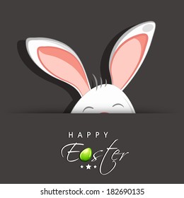 Happy Easter celebrations greeting card design with bunny ears on grey background and stylish text. 