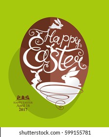 Happy easter. Chocolate gift egg with inscription and Easter bunnies. Greeting card April 16, 2017