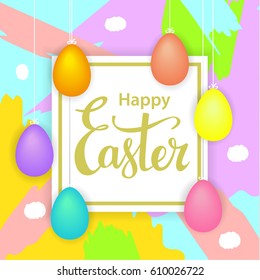 Happy easter colorful brush strokes artistic greeting background with hanging eggs on ropes over a card with hand lettering