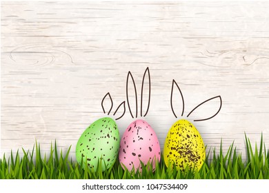 Happy Easter. Colorful, funny rabbit eggs, grass on bright wooden background. Design template for Banner, flyer, invitation, congratulation, greeting card, poster