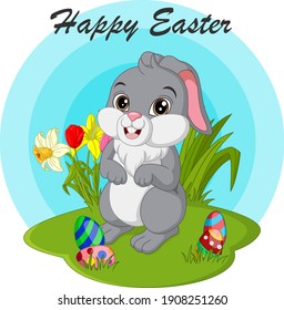 Happy Easter. Cute Easter bunny with eggs in the grass
