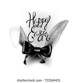 Happy Easter cute greeting card. Beautiful, realistic white bunny ears with black bow (ribbon) and lettering