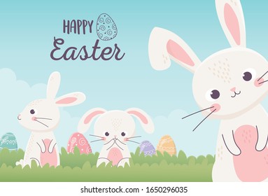 süße Osterkaninchen mit Ziereiern in der Grasgrafik