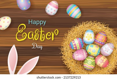 Happy Easter Day colorful egg in nest on beautiful wood background top view with copy space.