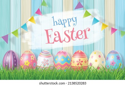 Happy Easter Day colorful egg on grass and beautiful wood background with copy space.