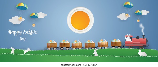 Happy Easter day concept.Rabbit is driving the train on green grass in spring season..vector style modern paper craft 