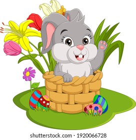 Happy Easter Day. Cute Easter bunny sitting in a basket