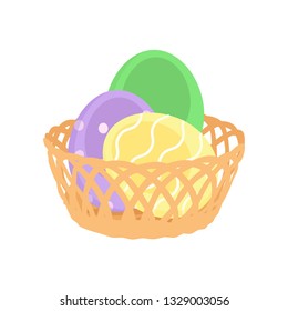 Happy Easter decoration. Decorated Easter eggs in wicker backet. Spring Holidays