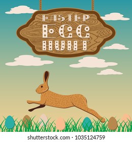 Happy easter egg hunt. Wooden signboard against the background of the evening sky. In the grass eggs. The Hare Jumps