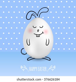 Happy Easter egg in a shape of cute happy smiling bunny on colored blue dotted background