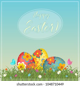 Happy easter. Easter eggs in the grass. Vector illustration.