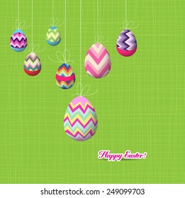 happy easter eggs hanging on the wire background